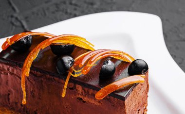 Chocolate cheesecake with fresh berries on plate