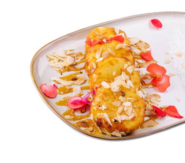 Cottage cheese pancakes with honey and almonds