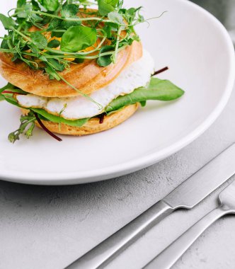 Healthy freshly baked bagel with egg