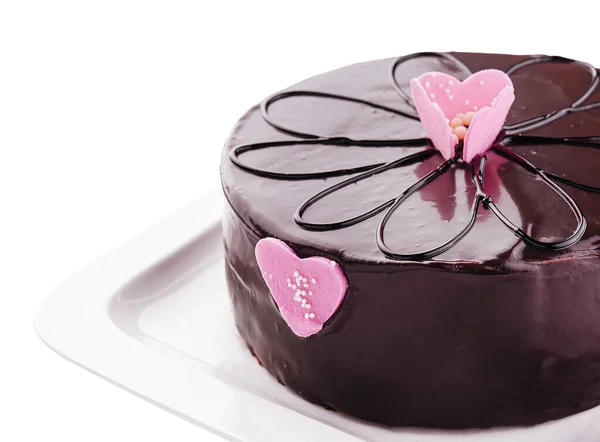 白で隔離されたチョコレートアイシングのケーキ — ストック写真