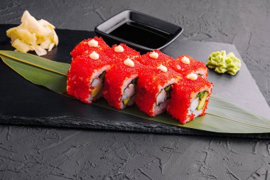 Sushi, rolls, California uramaki with tobiko caviar