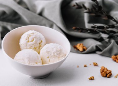 Vanilla ice cream balls with walnut