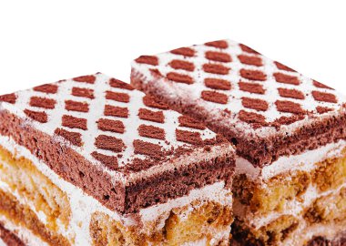 two pieces multi-layered cocoa sponge cake