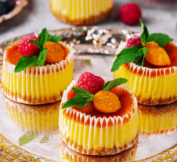 Mini cheesecake with apricot in muffin forms
