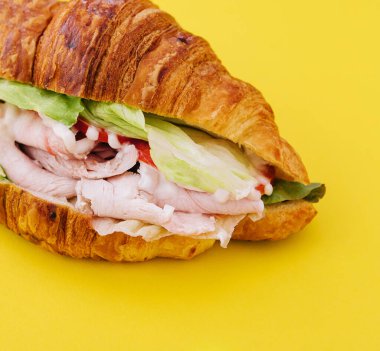 croissant brioche bread with chicken breast and vegetable