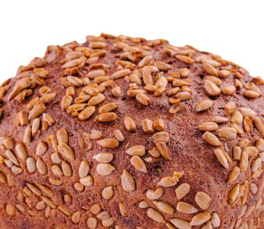 rye bread with sunflower seeds on a white