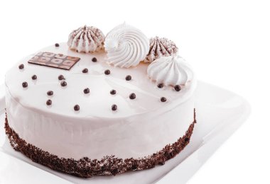 Delicious yogurt cake with meringue on plate