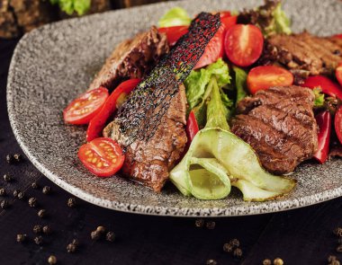 Warm beef salad served in plate