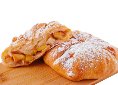 Baking puff pastry vertuta with apple or strudel