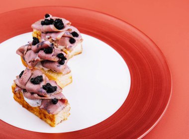 bruschetta with boiled pork and truffle sauce