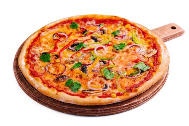 Delicious hot vegetable pizza on wood clipart