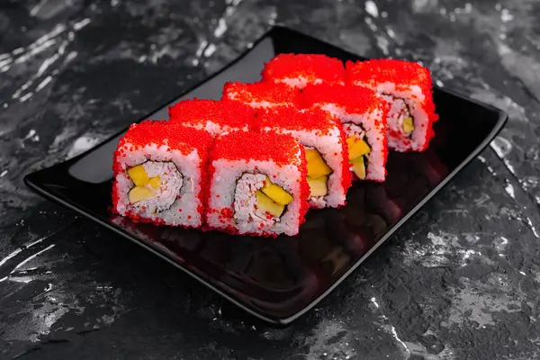 stock image Uramaki philadelphia roll filled with crab and avocado