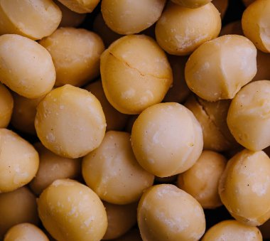 Lezzetli Macadamia fındıkları üst görünüm arka planı
