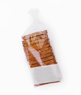 Şeffaf ambalajla dilimlenmiş beyaz tost ekmeğini kapat