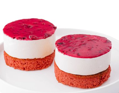 souffle cake with biscuit, birds milk on white plate