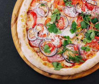 Delicious pizza isolated on a black background