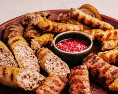 assorted barbecue of meat rolls or mici