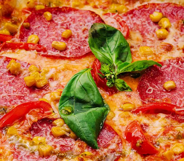 beautiful and tasty pepperoni pizza with corn