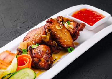 Fried chicken with sweet and sour sauce with vegetables