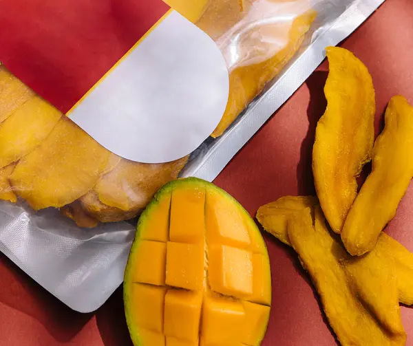 pack of dried mango slices and raw mango