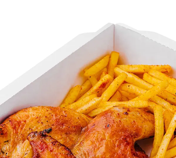 Fried chicken legs with french fries in paper box