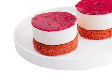 souffle cake with biscuit, birds milk on white plate