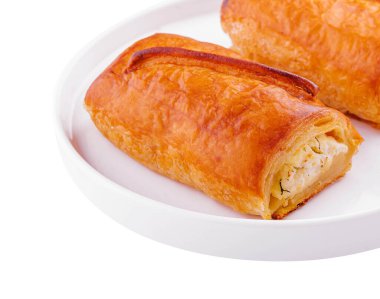 Two puff pies with cottage cheese in plate