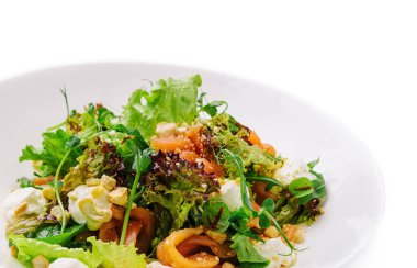 Fresh salad with cashew, mozzarella, pepper