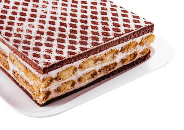 multi-layered Cocoa sponge cake isolated on white