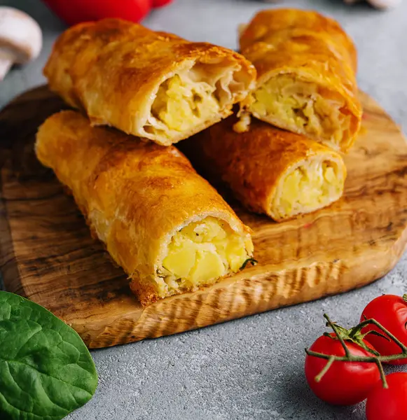 Baking puff pastry with potatoes in the cut