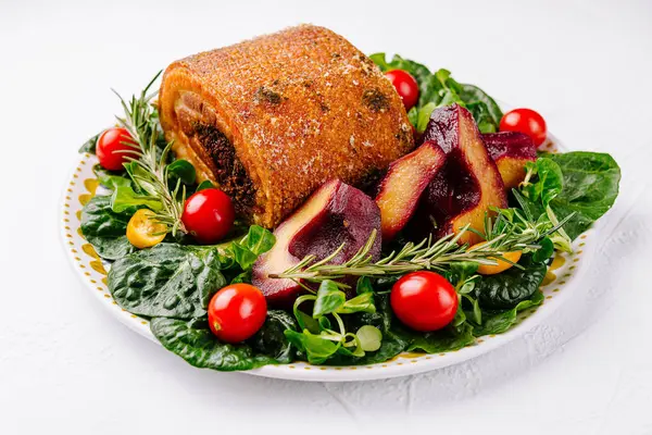 Succulent Roasted Pork Roll Served Spinach Salad Pears Cherry Tomatoes — Stock Photo, Image