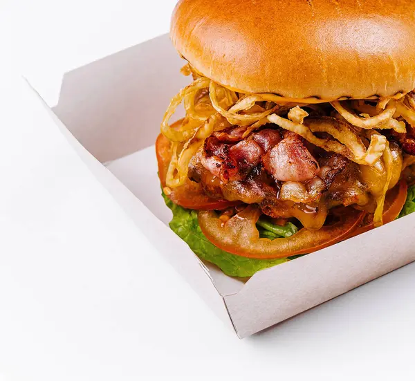 Hambúrguer Queijo Apetitoso Com Bacon Coberturas Uma Caixa Papelão Aberta Fotografia De Stock
