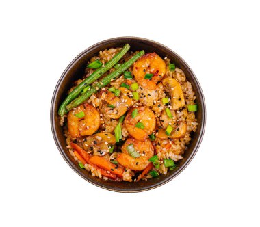 Lezzetli bir karidesin üst görüntüsü. Sebzeli ve pirinçli, siyah bir kasede.