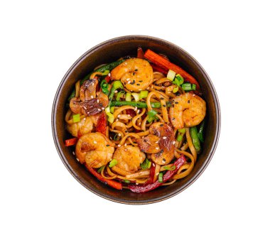 Top view of a delicious stir-fry with shrimp, noodles, and fresh vegetables in a bowl