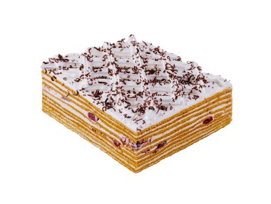 Çikolata parçacıkları ve çırpılmış kremayla süslenmiş lezzetli çok katmanlı ballı pasta.