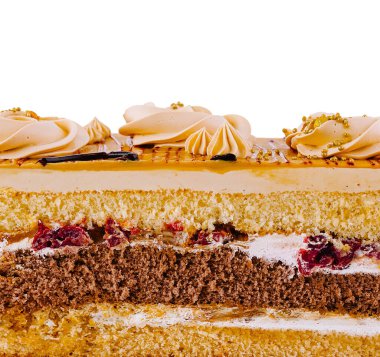 Lezzetli pasta çok katmanlı pasta, krema ve meyve dolgusunu gösteriyor.