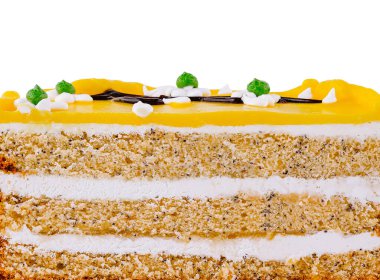 Limonlu keki sünger katmanları ve beyaz çikolata süslemeleri ile sulamak seni bir ısırık almaya teşvik ediyor.