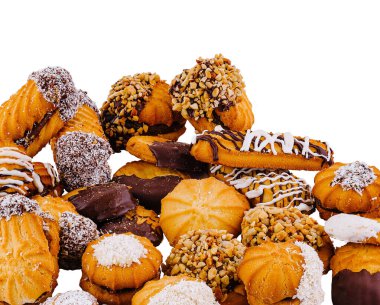 Çikolata ve fındıkla kaplı çeşitli lezzetli kurabiyeler, cezbedici ve hoşgörülü bir muamele yaratıyor.