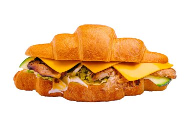 Bir kruvasan sandviçi sulu ızgara tavuk, erimiş peynir ve pullu katmanların arasına gizlenmiş gevrek sebzeleri ön plana çıkarır. Yemek ya da atıştırmalık için mükemmel..