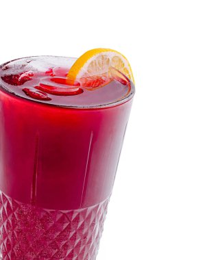 A vibrant red beverage filled with ice sits in a tall, textured glass, garnished with a slice of lemon. The drink looks cool and inviting, perfect for warm days. clipart