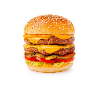 Bu ağız sulandıran duble çizburgerde iki sulu biftek köftesi, erimiş peynir, gevrek marul, domates, turşu ve her yemek için mükemmel bir kızarmış susamlı çörek var..