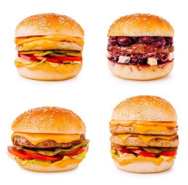 Bu lezzetli çizburgerin üzerinde erimiş peynir, taze marul, dilimlenmiş domates, turşu ve susamlı çöreğin içine yerleştirilmiş sulu bir köfte var. Lezzetli bir yemek için her zaman mükemmel..