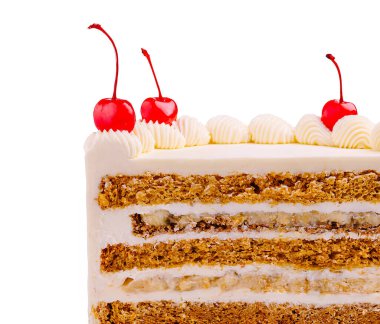 Çok güzel hazırlanmış bir pasta üzerinde parlak kırmızı kirazlarla süslenmiş birden fazla sünger ve krema katmanına sahiptir. Kutlamalar ya da özel durumlar için mükemmel. İnanılmaz cezbedici görünüyor..