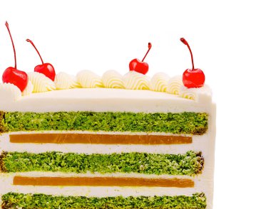 Bu ağız sulandırıcı kek üzerinde birden fazla yeşil dolgu tabakası, kremalı krema ve vişne içerir. Kutlamalar için mükemmel ya da özel bir şey arayan tatlı severler için..
