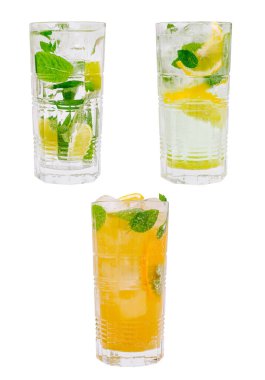 Üç uzun bardak nane ve narenciye ile ferahlatıcı içecekler içerir. İçkiler limon ve limon dilimleriyle süslenmiş. Havuz kenarında sıcak yaz günleri için mükemmel..