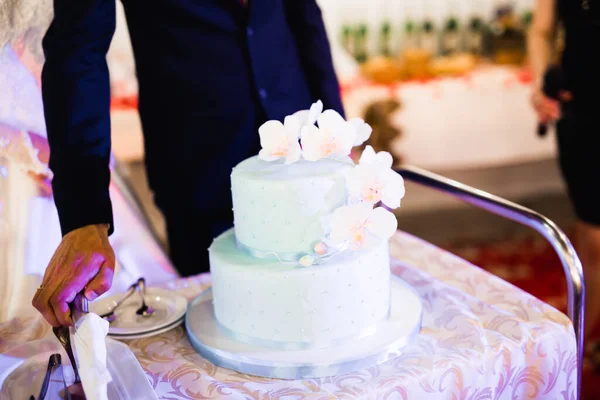 Luxury decorated wedding cake on the table.