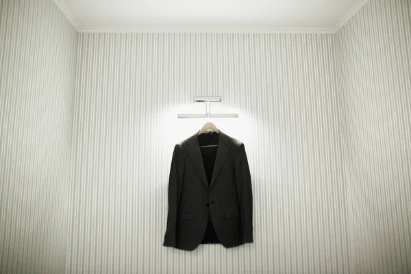 Stylish groom suit in dressing room indoors.