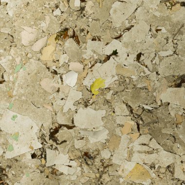 Grunge background of old paper with yellow fallen leaves. Texture