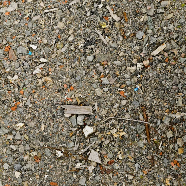 Garbage on the ground as a background. Close-up.