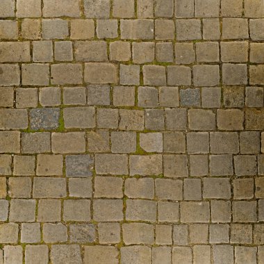 Cobblestone pavement background. Seamless square texture.